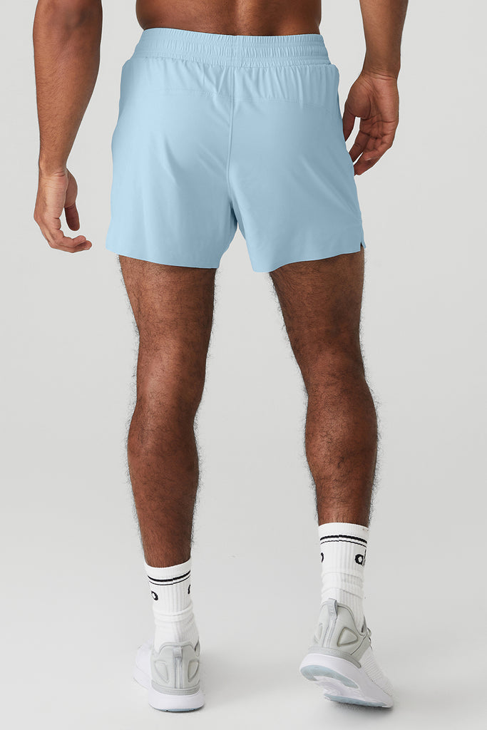 Blue Nike running shorts